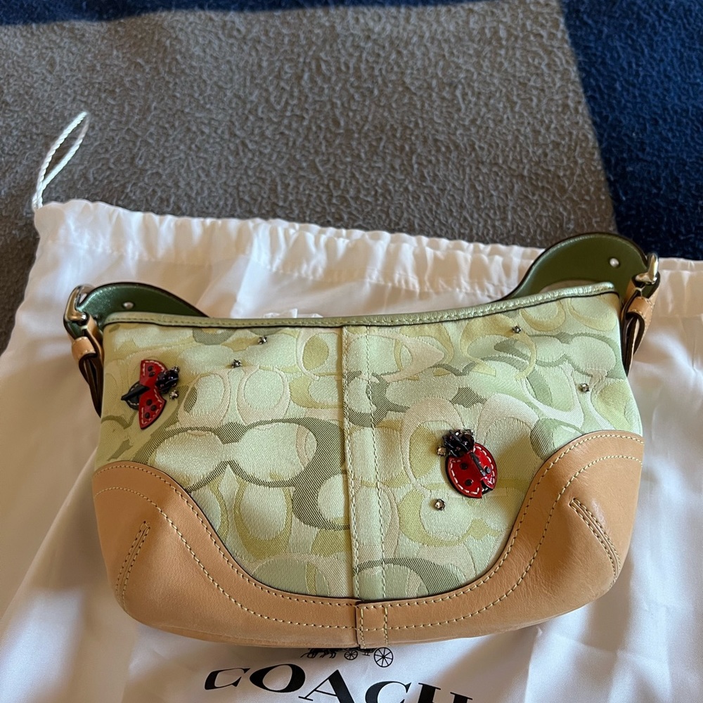 Coach small green Coach print ladybug